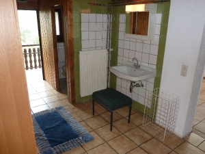 Dachzimmer und Balkon
